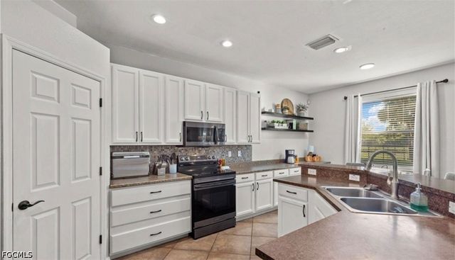 321 Shadow Lakes DR, Lehigh Acres, FL 33974