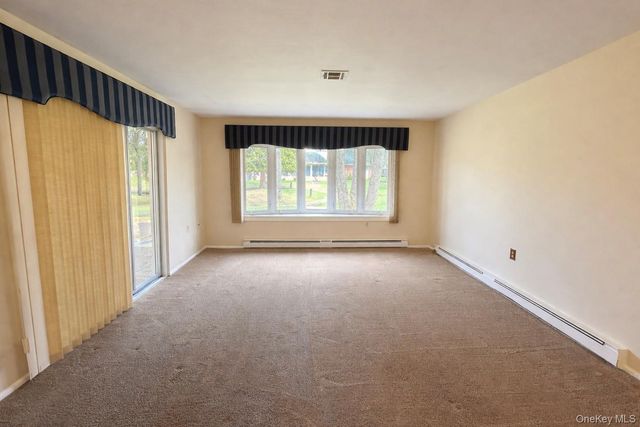 9 Guilford Court B, Ridge, NY 11961