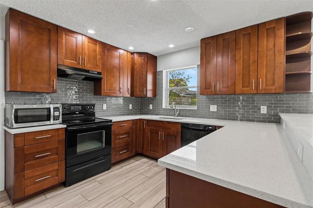 3941 NW 4th Ct, Coconut Creek, FL 33066