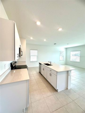 8795 COQUI SONG LANE, Land O Lakes, FL 34637