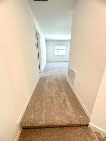 8795 COQUI SONG LANE, Land O Lakes, FL 34637