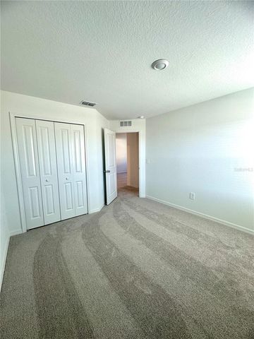 8795 COQUI SONG LANE, Land O Lakes, FL 34637