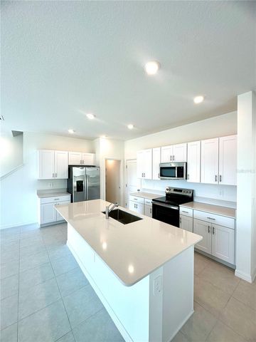 8795 COQUI SONG LANE, Land O Lakes, FL 34637