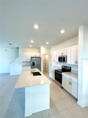 8795 COQUI SONG LANE, Land O Lakes, FL 34637