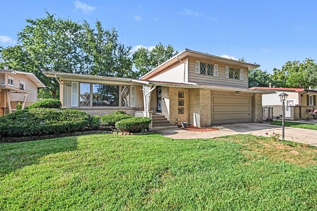 906 N Rainbow Drive, Glenwood, IL 60425
