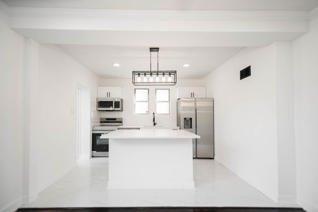 8013 S Harper Avenue, Chicago, IL 60619
