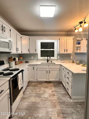 1506 E Oak Island Drive, Oak Island, NC 28465