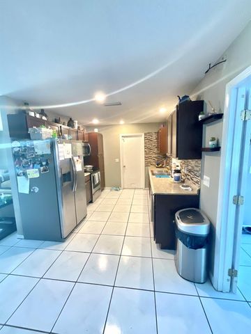 409 NE Oleander Avenue, Port St Lucie, FL 34952
