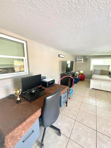 409 NE Oleander Avenue, Port St Lucie, FL 34952