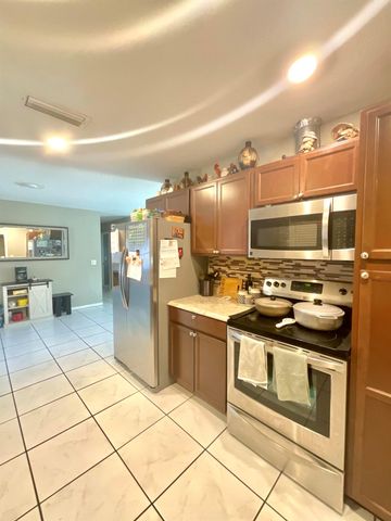 409 NE Oleander Avenue, Port St Lucie, FL 34952