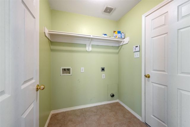 12731 Whistling Springs Drive, Humble, TX 77346