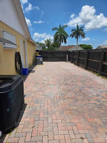 1402 Denlow Lane, Royal Palm Beach, FL 33411