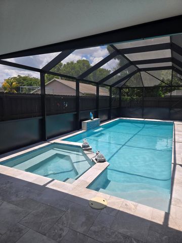 1402 Denlow Lane, Royal Palm Beach, FL 33411