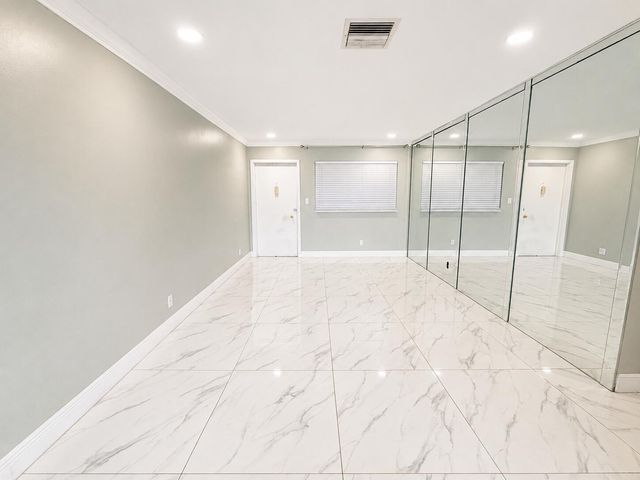 941 CRYSTAL LAKE Drive 309, Deerfield Beach, FL 33064