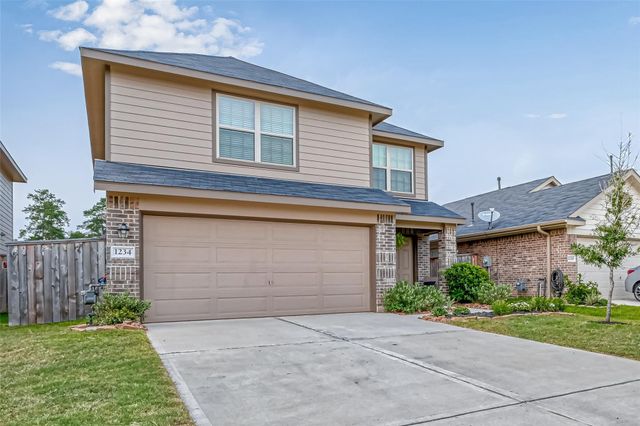 1234 Blue Hazel Court, Pinehurst, TX 77362