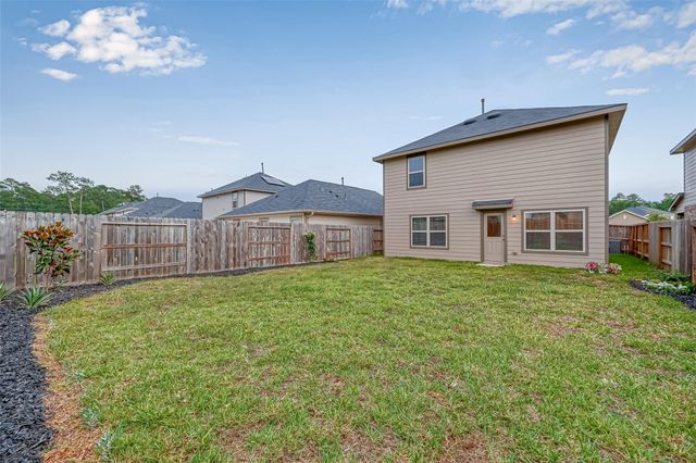 1234 Blue Hazel Court, Pinehurst, TX 77362