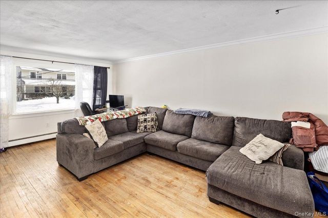 64 Eastport Drive, Sound Beach, NY 11789