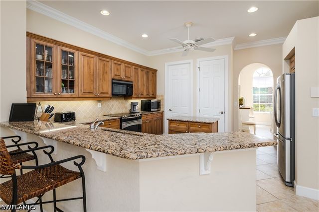 8754 Hideaway Harbor CT, Naples, FL 34120