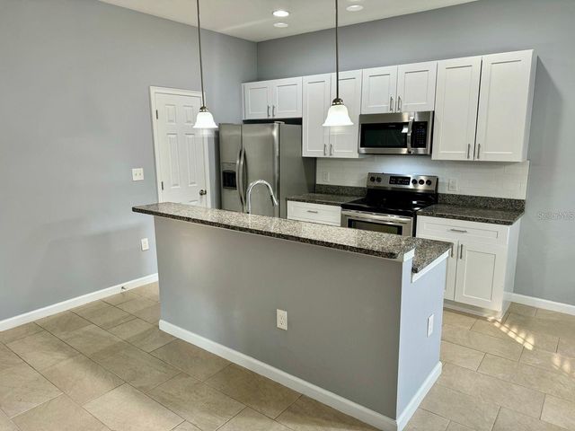 930 LAKEFRONT VILLAGE DRIVE, Clermont, FL 34711