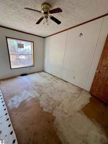 9374 Pine Circle Drive NW, Rapid City, MI 49676