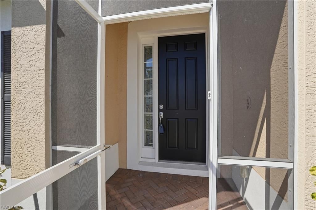 2457 Sutherland CT, CAPE CORAL, FL 33991 — photo 2