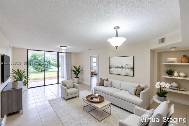 5681 Riverside Dr 105A6, Coral Springs, FL 33067