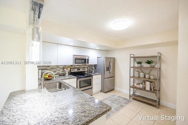 5681 Riverside Dr 105A6, Coral Springs, FL 33067