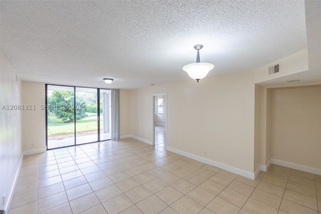 5681 Riverside Dr 105A6, Coral Springs, FL 33067