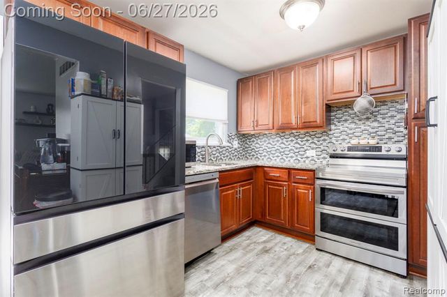 15212 Orchard Court, Romulus, MI 48174