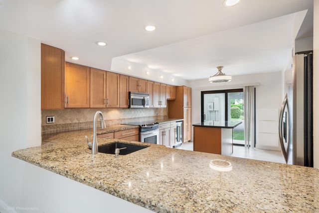 320 Deer Creek Wildwood Lane E, Deerfield Beach, FL 33442