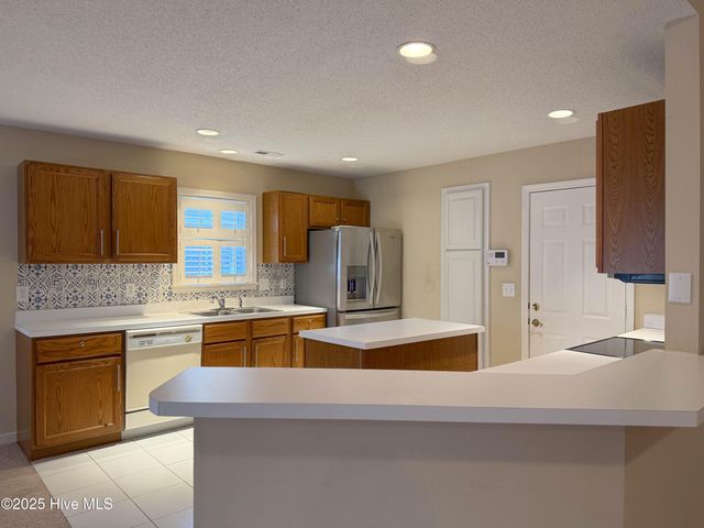 9402 Short Putt Court, Wilmington, NC 28412