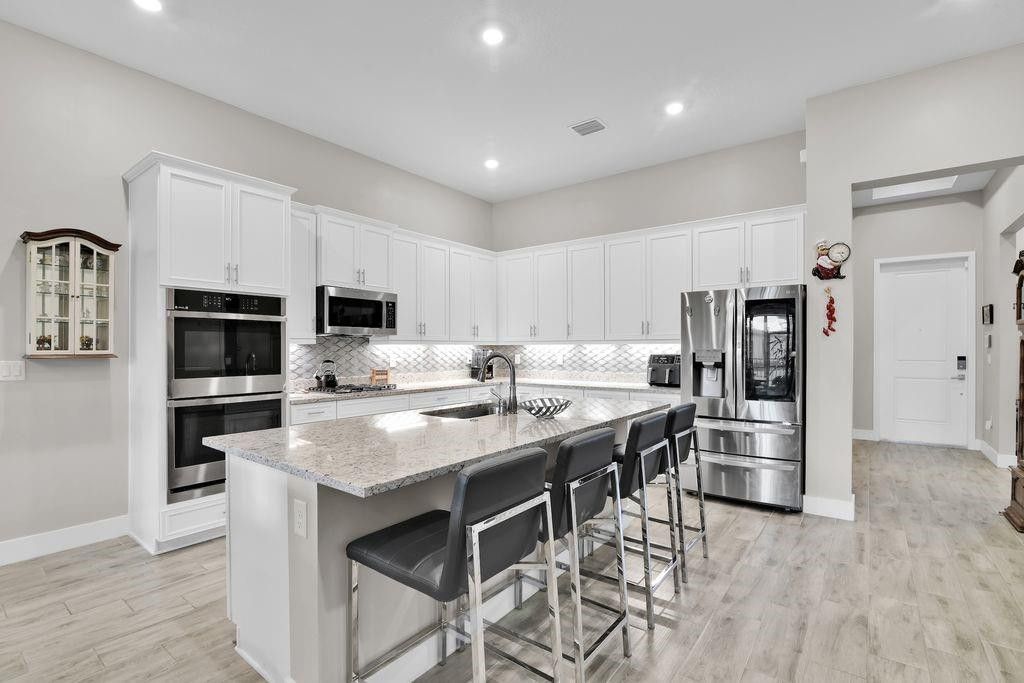 Image 20 of property listing at 7524 N Blue Spring Drive, Parkland, FL 33067