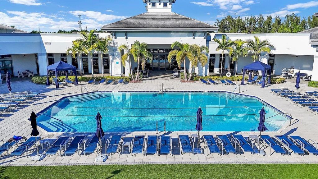 Image 59 of property listing at 7524 N Blue Spring Drive, Parkland, FL 33067