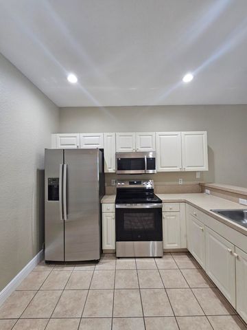1967 FREEPORT Drive, Riviera Beach, FL 33404