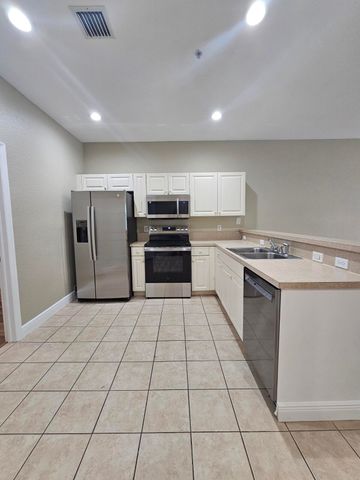 1967 FREEPORT Drive, Riviera Beach, FL 33404