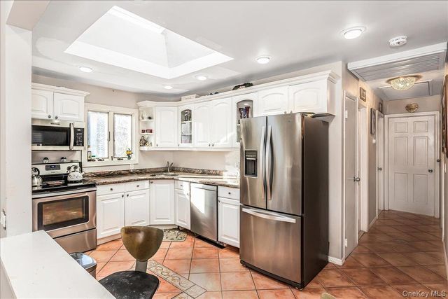 85 Unqua Road, Massapequa, NY 11758