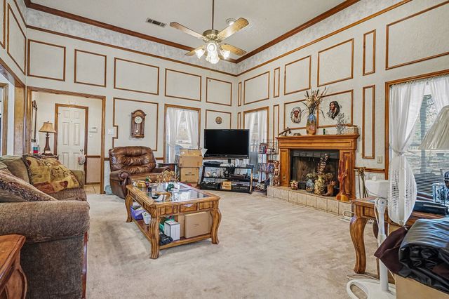 7 Brian Place, Pecan Hill, TX 75165