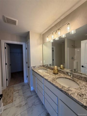 1034 Camellia Circle 46, Howell, MI 48843