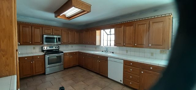 1202 Honeysuckle Drive, Keene, TX 76059