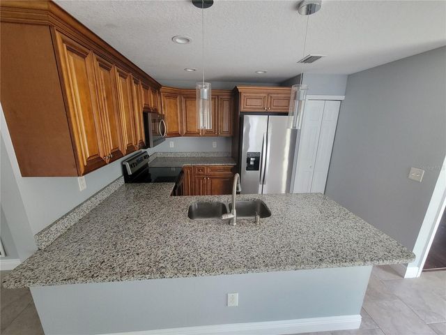 1607 E LINEBAUGH AVE, Tampa, FL 33612