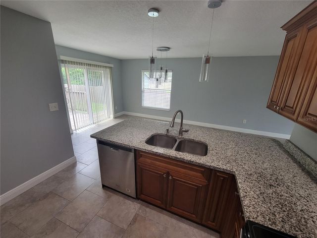 1607 E LINEBAUGH AVE, Tampa, FL 33612