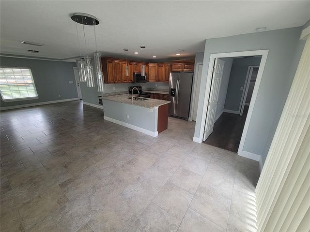 1607 E LINEBAUGH AVE, Tampa, FL 33612