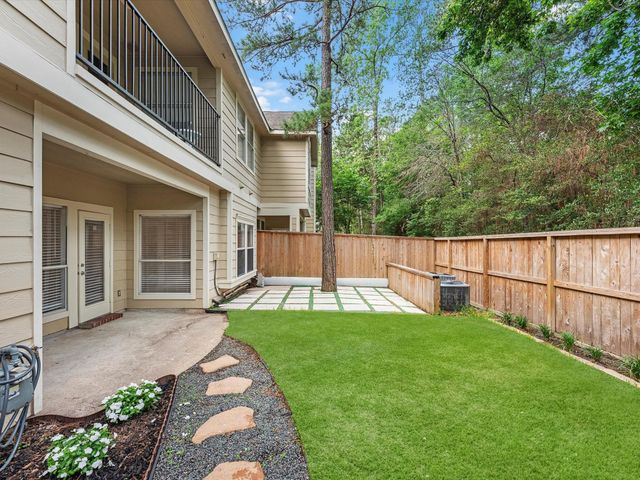 142 N Magnolia Pond Place, The Woodlands, TX 77381