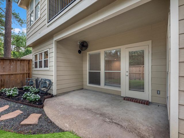 142 N Magnolia Pond Place, The Woodlands, TX 77381