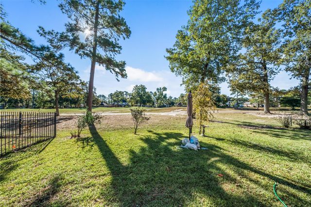 8402 Hunters Village Drive, Humble, TX 77346