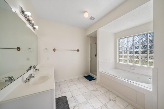 8402 Hunters Village Drive, Humble, TX 77346