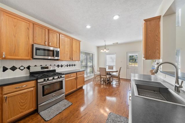 8402 Hunters Village Drive, Humble, TX 77346