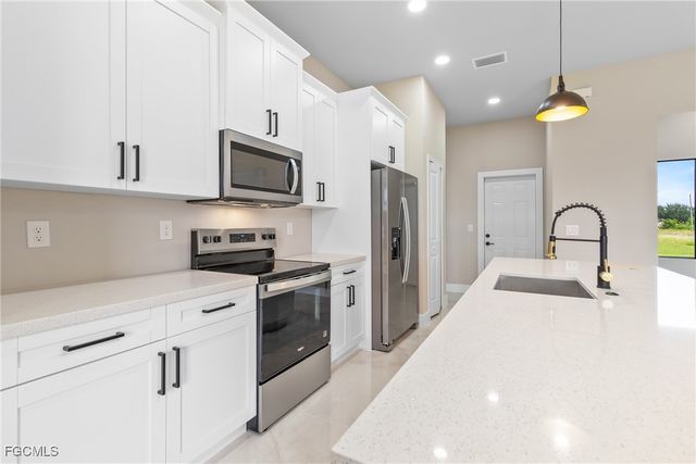 2809 25th ST SW, Lehigh Acres, FL 33976