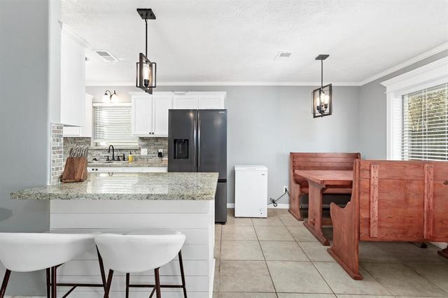 1845 King Arthur Court, Pinehurst, TX 77630