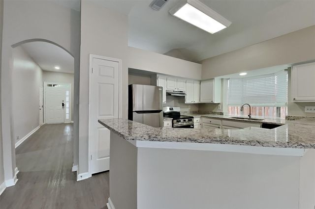 5026 Maple Brook Lane, Houston, TX 77345